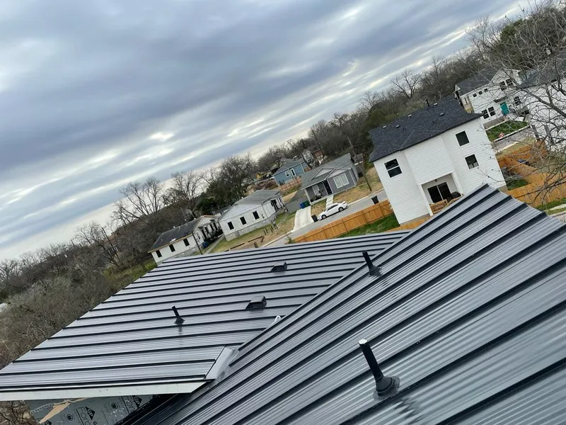 Standing seam metal roof panels with vents for Skylight Repair in Ohio